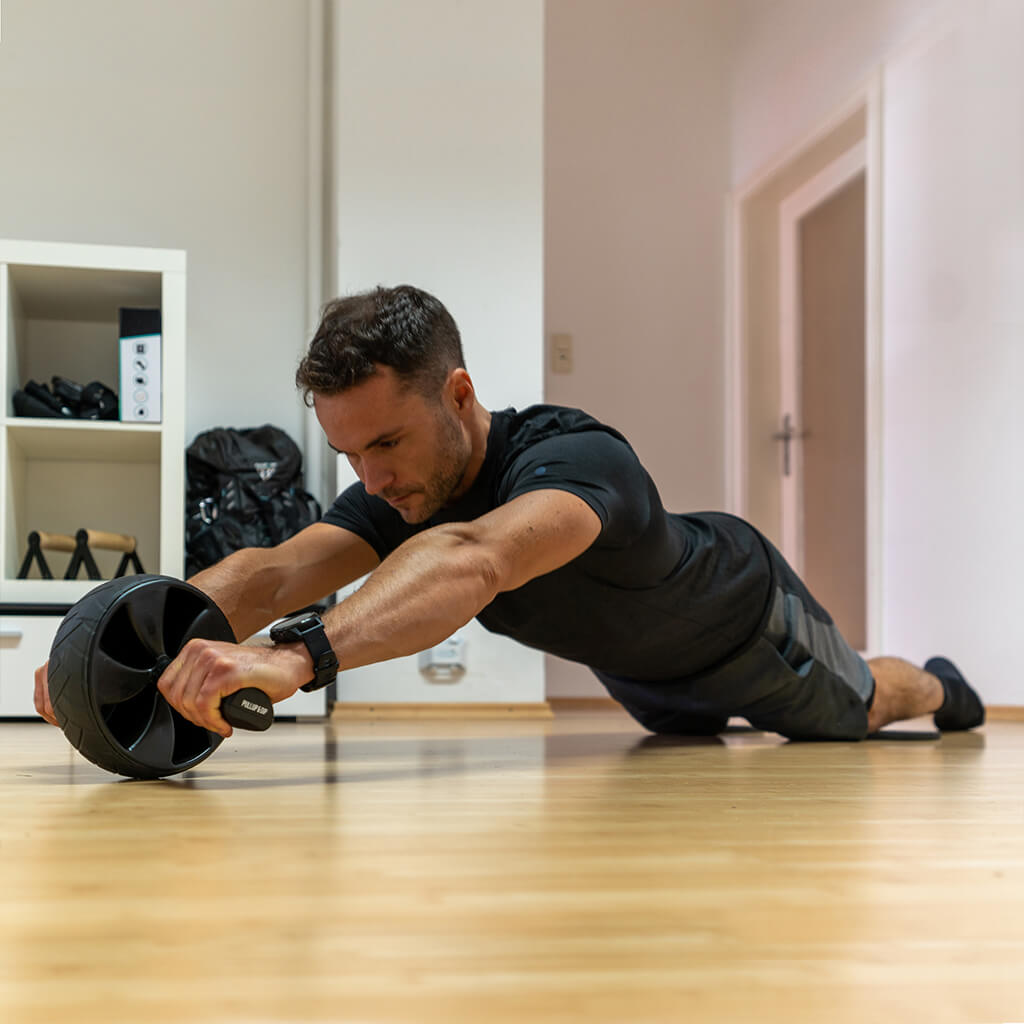 Ab Wheel with Slip-Resistant Knee Pads for Training the Abdominal and Core Musculature