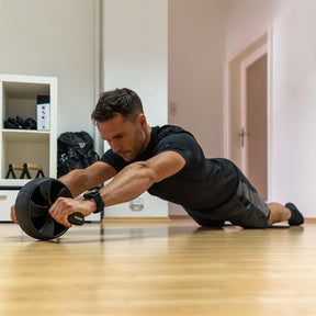 Ab Wheel with Slip-Resistant Knee Pads for Training the Abdominal and Core Musculature